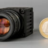 Image: Atom camera beside a one Euro coin.