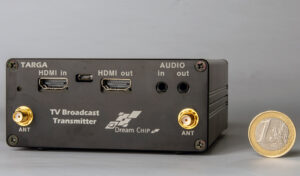Product photo of rear-facing Barracuda encoder/decoder beside a 1-Euro coin.