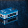CyanView CIO product shot with a blue textured background