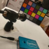 Image of Cy-CI0 on a table with an ATOM camera